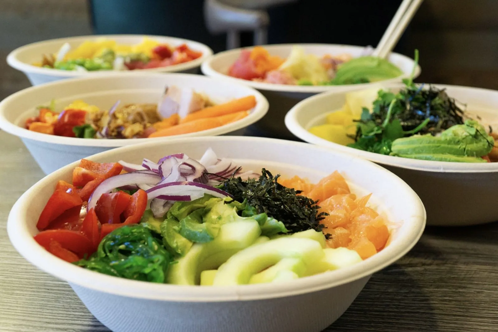 Poke bowls with salmon, avocado, veggies and seaweed at Poke King, a Hawaiian Restaurant in Spokane