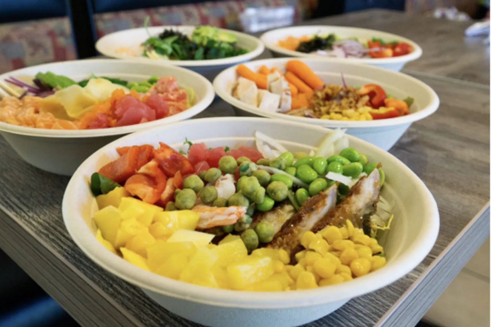 Poke bowl with seafood, mango, corn and edamame at Poke King, a Hawaiian Restaurant in Spokane